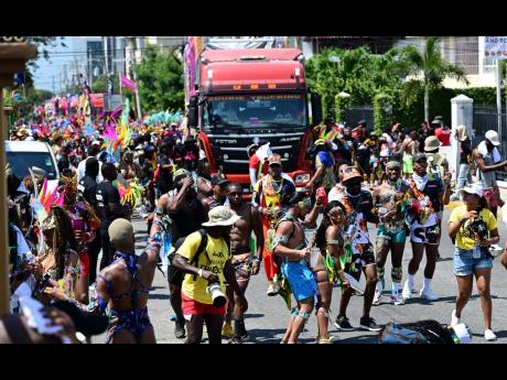 Gen Xs revellers during the 2024 carnival road march activities in St Andrew. 