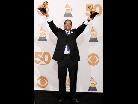 Credit: AP/File
Herbie Hancock poses with the awards for Album of the Year and Best Contemporary Jazz Album at the Grammy Awards in Los Angeles in February 2008. The jazz luminary is the ambassador for International Jazz Day, which is listed on the calendars of the Unite
