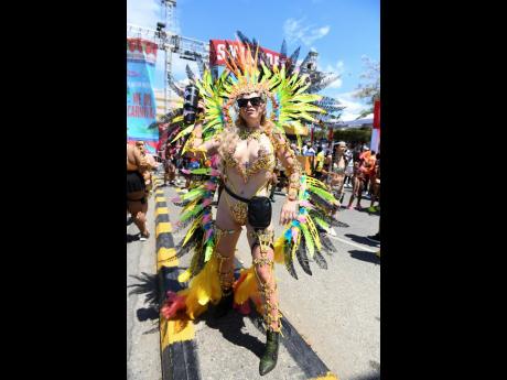 Credit: Ricardo Makyn Elodie Lecroart, a nurse from France visiting Jamaica for the first time, wore Swallowtail for Yard Mas’ Jamaica Land we Love.