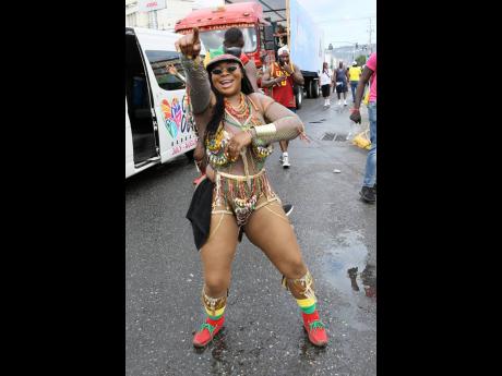 Yard Mas reveller, dancehall artiste Stacious.