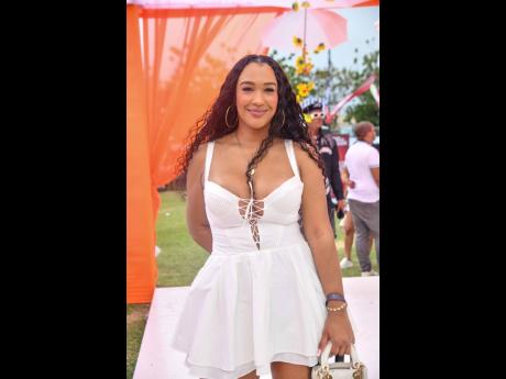Aaliyah Baptiste decides on a white mini for brunch.