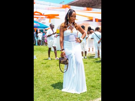 Shenice Ettienne is the moment in a sheer maxi dress that perfectly complements her silhouette.