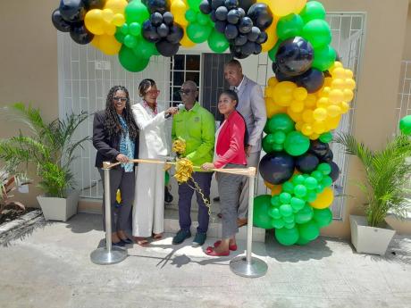 Credit: Bryan Miller photo From left: Tamika Davis, member of parliament for Hanover Western; Andria Dehaney-Grant, deputy mayor of Lucea; Local Government Minister Desmond McKenzie; Kayon Dyer, the matron at the Hanover Infirmary; and David Gardener, the chief executive officer at