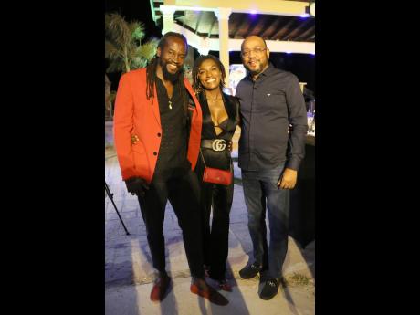 Credit: Nathaniel Stewart Celebrating a successful launch are (from left) Clinton Valentine and Annika D’Andrea, principals of Tiamo Beach Resort, and Michael Belnavis, mayor of St Ann’s Bay.