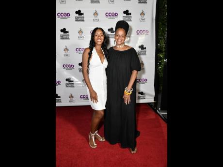 Festival Director Savannah Peridot (left) and Mitzie Williams, communications manager, Bob and Rita Marley Foundation, are all smiles at the launch of GATFFEST at the Bob Marley Museum on Saturday.