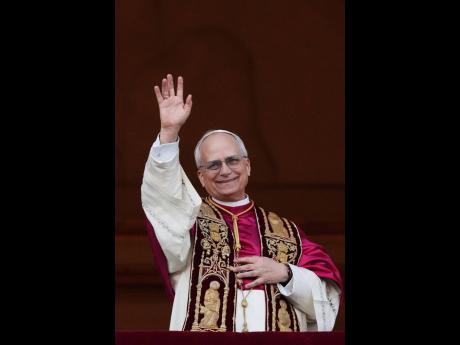 Newly elected Pope Leo XIV appears at the balcony of St. Peter’s Basilica at the Vatican, Thursday, May 8.
