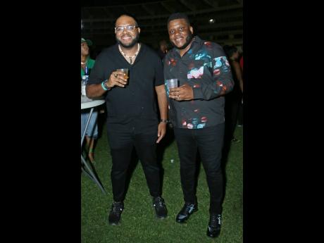 Dominic Bell (left), communications manager, J. Wray and Nephew, and Cecil Smith, commercial director.