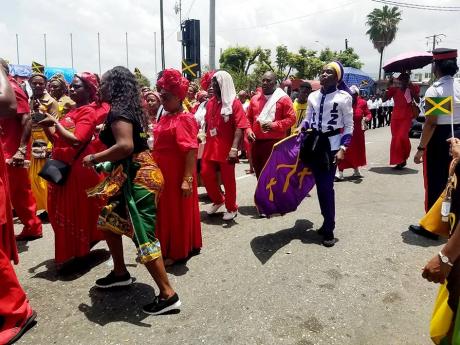 Revivalists participate in the August 3, 2022, Independence Week float parade in Half-Way Tree, St Andrew.