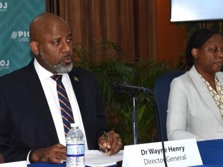 Director General of the Planning Institute of Jamaica, Dr Wayne Henry, speaking at the agency's Quarterly Press Briefing on May 21. 