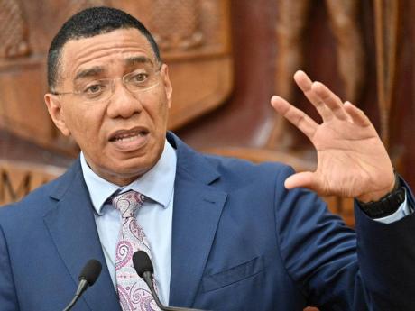 Prime Minister Dr Andrew Holness speaking at a post-Cabinet press briefing at Jamaica House in St Andrew on May 22.