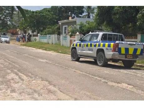 The police at the scene of a fatal shooting involving the security forces in the community of Ebonyvale in Spanish Town, St Catherine on May 22.