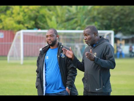 Mount Pleasant head coach Theodore Whitmore (right) and his assistant, Davion Ferguson. 
