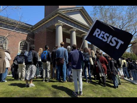 Students, faculty and members of the Harvard University community rally, Thursday, April 17, 2025, in Cambridge, Mass. (AP Photo)