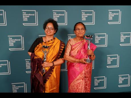 
Banu Mushtaq, author of ‘Heart Lamp’ (right), and Deepa Bhasthi hold the trophies after winning the International Booker Prize, in London.