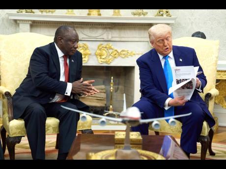 President Donald Trump meets South Africa’s President Cyril Ramaphosa in the Oval Office of the White House, Wednesday, May 21 in Washington. 