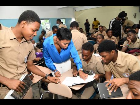 Nicole McLaren Campbell chats with St George’s College students and shares productivity strategies and tools that they can apply in achieving academic and personal goals, in this 2023 photo.