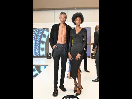 Credit: Contributed Post-victory in April 2023, Dru Campbell (right), who copped the Female Fashion of the Caribbean title at the SAINT International-produced fashion finals, shared a frame with the competition’s male winner, TK Wilson.