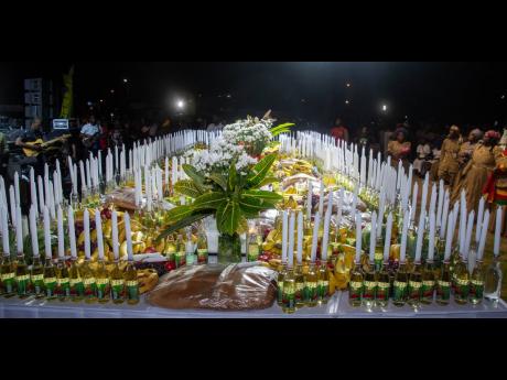 A solemn 8x32-foot Revival table, beautifully adorned with 433 candles, fruits, traditional bread, and sacred offerings, served as the spiritual centerpiece of the inaugural National Revival Conference and Church Service. The table honoured the late Prime 