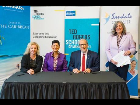 TRSM hosted senior leaders from Sandals Corporate University for the formal signing of the new partnership with the Executive and Corporate Education team. Training will take place in Jamaica for 100 senior-level Sandals team members in October. Those in a