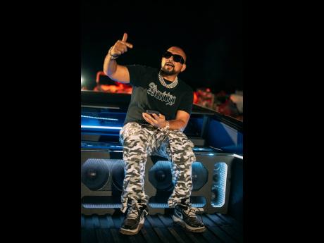 Sean Paul delivers high-energy verses from ‘Nah Follow Dem’ while seated in his customised Tesla Cybertruck during the music video shoot.