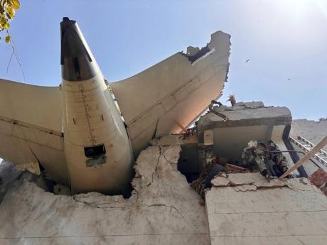 Credit: Uncredited This photo shared by India's Central Industrial Security Force (CISF) shows debris of a plane that crashed in the northwestern Indian city of Ahmedabad, in Gujarat state, Thursday, June 12, 2025. (CISF via AP)