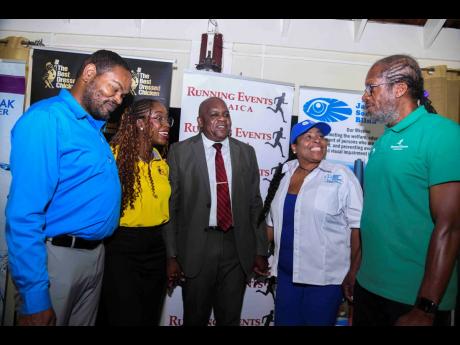 Credit: Antoine Lodge/Photographer From left: Daemion McLean, chairman of the Jamaica Society for the Blind; Arielle Oliver, brand manager for Best Dressed Chicken; Senator Floyd Morris, patron of the Everyone’s A Winner 3k & 5k Walk & Run; Nora Blake, manager at Jamaica Social Stock Exch