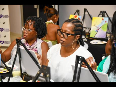 Credit: Matthew McKoy Preemie mom Nadia Nivens-Jarrett focuses on her ‘masterpiece’.