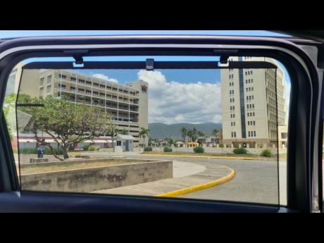 Credit: Kareem LaTouche The retractable rear shade visor, providing privacy and sun protection for occupants.