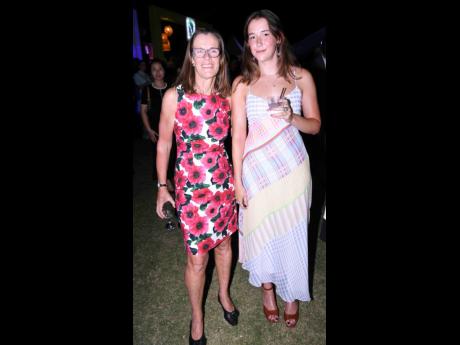 British High Commissioner to Jamaica Judith Slater (left) draws close to her daughter, India de Waal, for this photo opportunity.