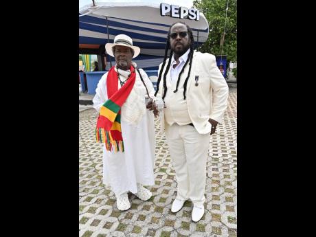 Credit: Rudolph Brown Bongo Herman (left) and Claude ‘Big Stone’ Sinclair dressed in white in honour of Rastafarian singer Junior Byles, who was from the tribe of Joseph. The colour that represents the tribe is white.