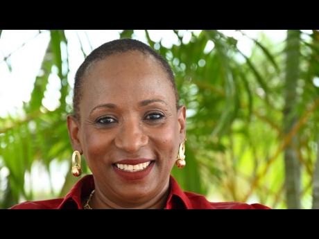 Credit: Janet Silvera Surrounded by family, Clark draws strength and support in her journey with alopecia.