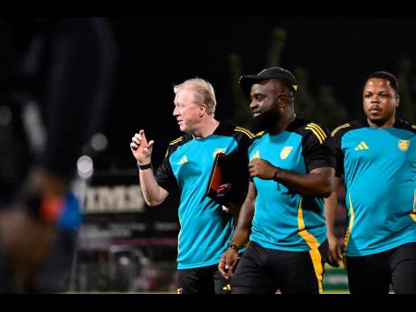 Credit: Gladstone Taylor From left: Reggae Boyz head coach Steve McClaren with assistants Merron Gordon and Andrew Peart.