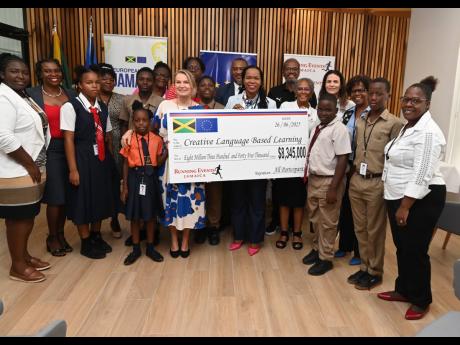 Credit: Contributed From centre: Dr Erja Askola; European Union mbassador; Dr Kasan Troupe; permanent secretary in the Ministry of Education, Skills, Youth and Information; Diane Ellis, director of Running Events Jamaica ; Mandy Melvin, executive director of Creative Language