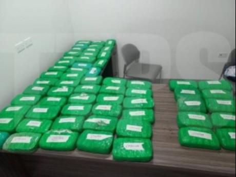 Police said that the compressed cannabis was found after they intercepted the 25-year-old man after days of surveillance at the port.
