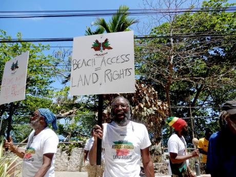Dr Devon Taylor leading a protest at Little Dunn’s River in this March 2024 photograph.