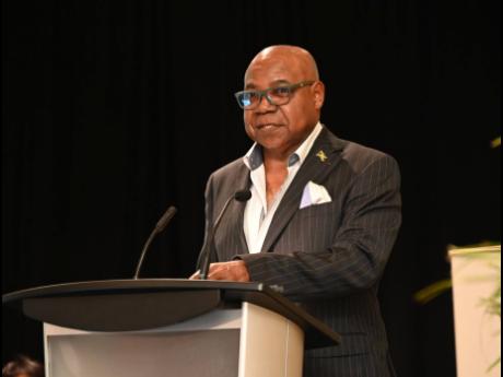 Minister of Tourism, Edmund Bartlett addresses the audience during the Jamaica Hotel and Tourist Association's Annual General Meeting at the Dreams Rose Hall Resort & Spa in Montego Bay on Saturday, June 28, 2025.