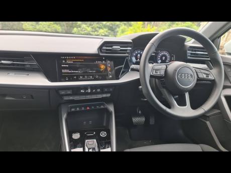 Credit: Kareem LaTouche The centre console features an intuitive infotainment interface and a cleanly laid-out control system.