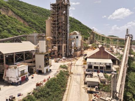 The expanded kiln which includes a new main baghouse, a solid fuel dosing system with storage silo, CO₂ fire suppression and inerting systems, upgraded process ducts, a new compressed air system, and a kiln chimney. 