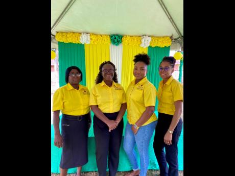From left: Bellevue Hospital representatives Annette Francis medical, social worker; Milicent Brown-Thompson, medical social worker; Joelle Foreman, social work secretary; and Anya Green, senior social worker, pose for a group photo during the Family Day e