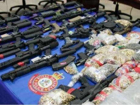 Guns and ammunition seized by the police in the Bahamas. 
