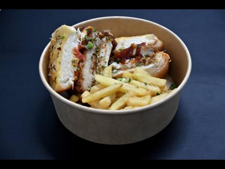 2. For variety, the restaurant also offers a chicken burger, served with fries. 