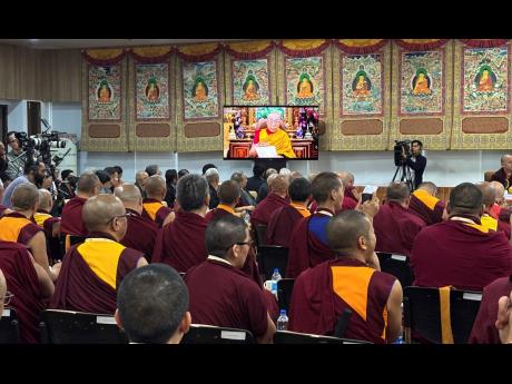 
Buddhist monks of various schools of Tibetan Buddhism watch a recorded video message by Tibetan spiritual leader the Dalai Lama in Dharamshala, India, last Wednesday.