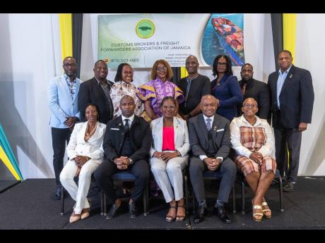 The 2025-26 executive of the CBFFAJ pose for a group photo. Front row (from left) are vice-presidents Ann Brown Chang, Leon Smith; Marcia Bent, president, Clive Coke, immediate past president; and Susan Neil, vice-president. Back row (from left) executive 