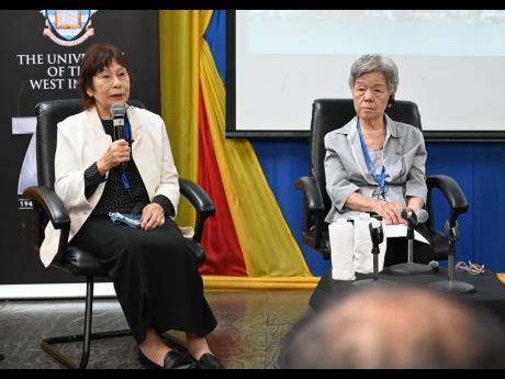 Kuramori Terumi (left) and Junko Watanabe, both hibakusha (survivors of atomic bombings), give their testimony during a Peace Boat lecture to students at The University of The West Indies, Mona, Western Jamaica Campus on Saturday.