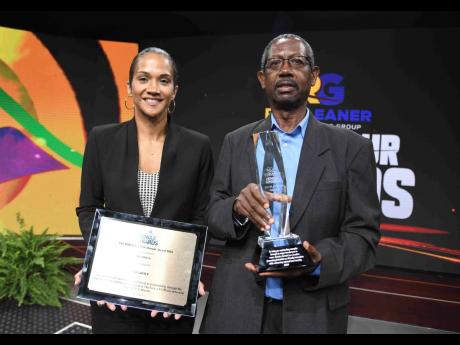 Credit: Antoine Lodge/Photographer Alicia Bogues, head of regional development, and Garth Channer, deputy CEO, both of CB Group, were on hand to receive the RJRGLEANER Honour Awards’ Platinum Award during the 45th RJRGLEANER Honour Awards Ceremony recognising achievements across various s