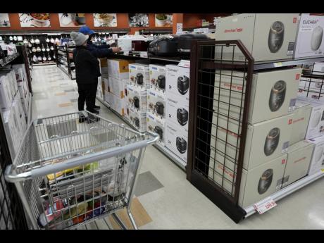  Shoppers shop electric rice cookers imported from Japan and Korea at the H Mart in Niles, Ill on April 3, 2025.