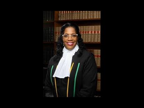 The tribunal applies principles of international administrative law, excluding national laws of Commonwealth countries in employment-related cases.