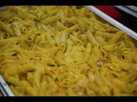 The creamy curried shrimp Alfredo from Tyschane’s Kitchen did extremely well at the night market.