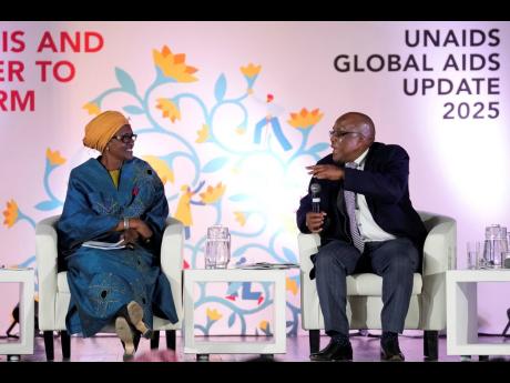 South Africa’s Minister of Health Aaron Motsoaledi (right), speaks as Winnie Byanyima, executive director of UNAIDS and under-secretary-general of the United Nations, watches on during the UNAIDS report release at Bertha Gxowa Hospital in Germiston, Sout