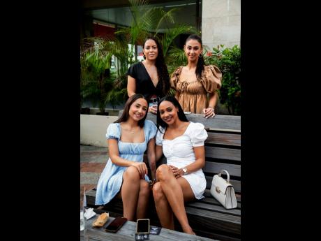 Credit: Contributed It’s all smiles with (back row, from left) Lesley Alexander, account manager, Fidcom Limited, and Allison Perkins, assistant manager, Lee’s Optical, joined by (front row, from left) Stephanie Wehby, business strategy and transformation consultant, PwC